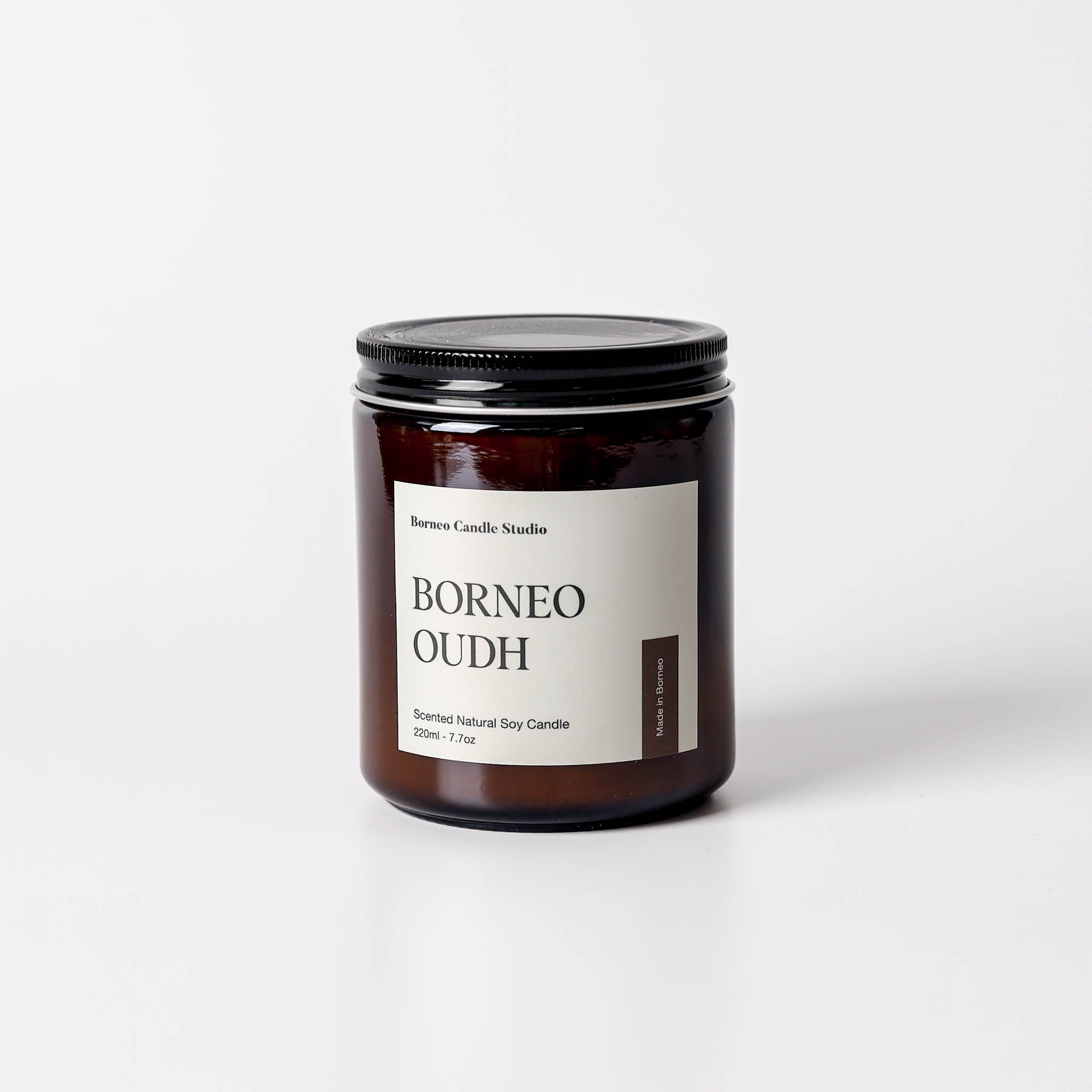 Borneo Oudh Soy Candle - agarwood, leather, elemi, oud scented candle in 7.7 oz amber glass jar with lid