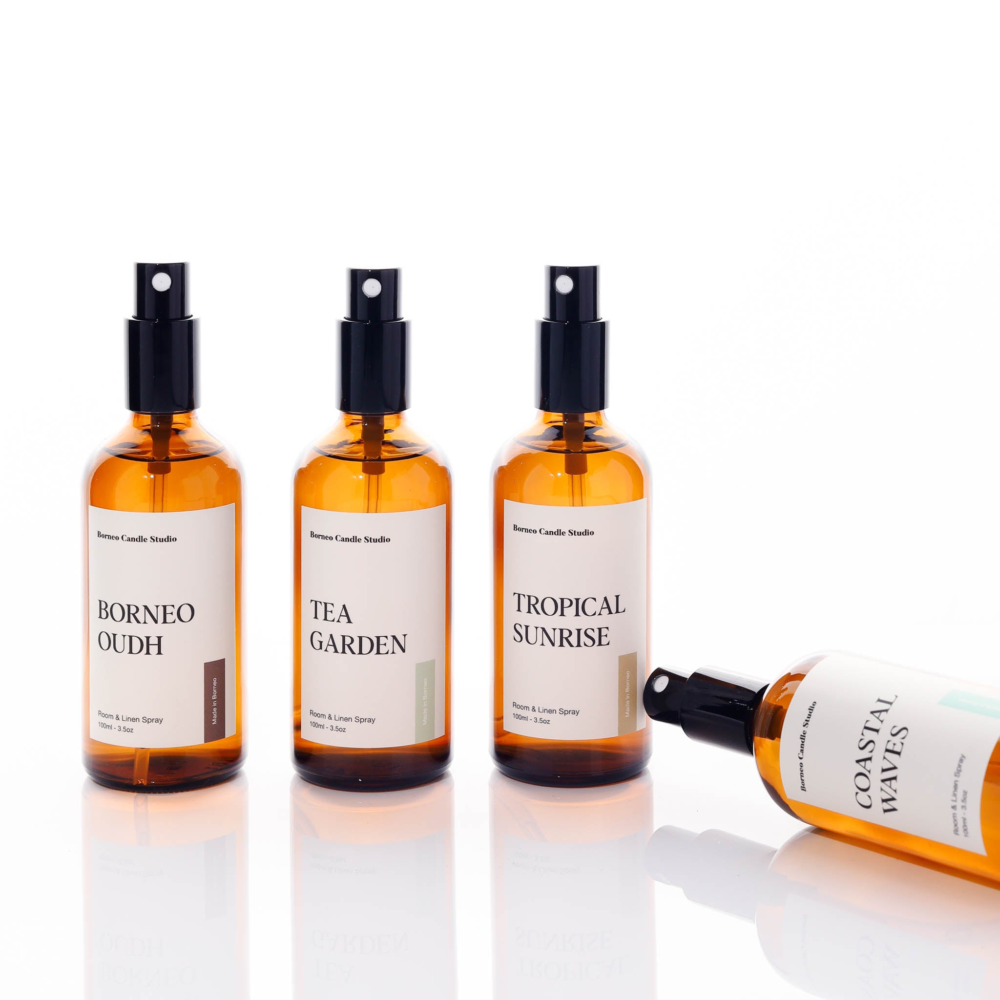 A collection of room spray in amber glass clear home fragrance by Borneo Candle Studio