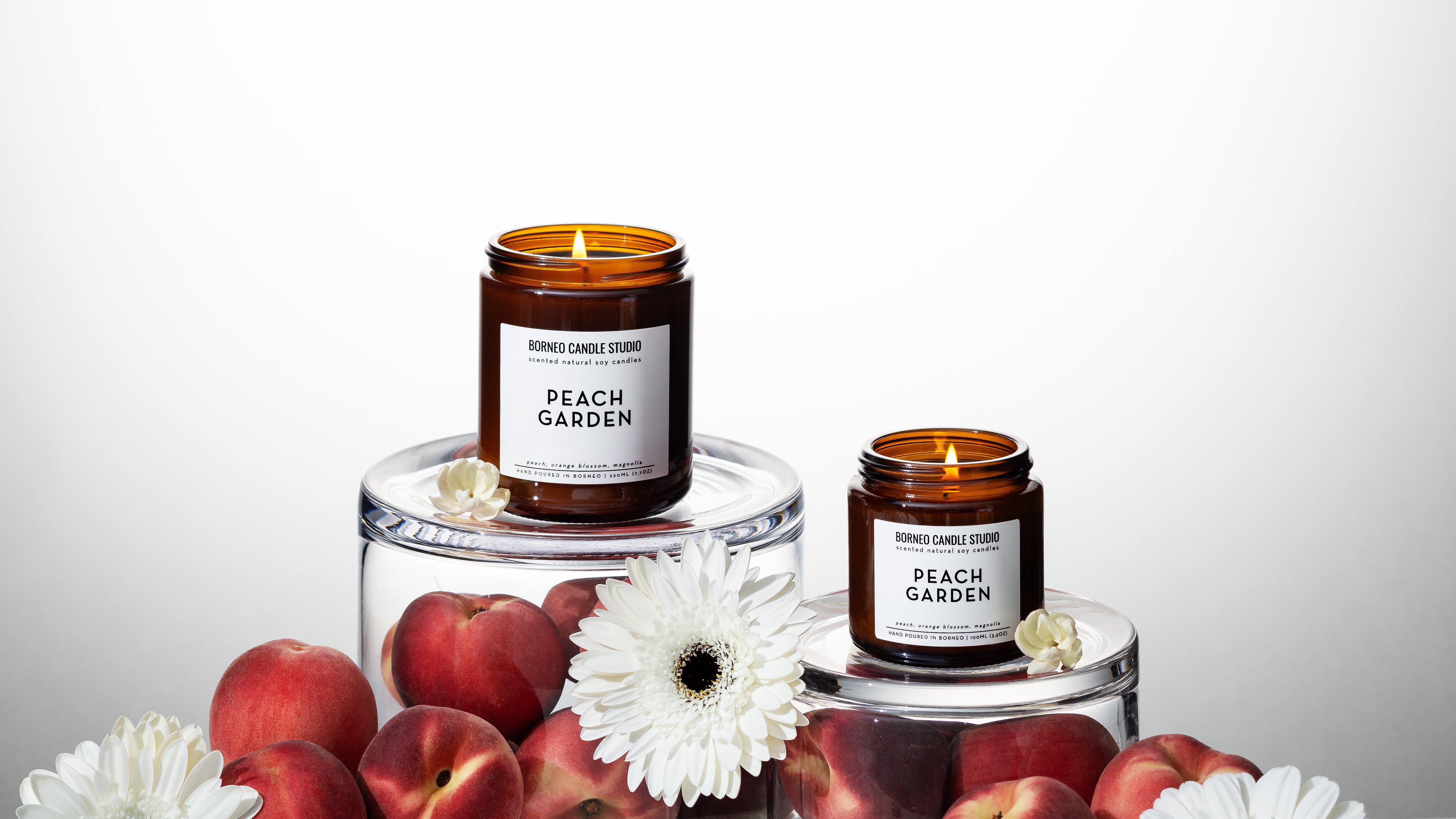 Peach Garden, a fruity floral scented candle with notes of peach, orange blossom and magnolia made by Borneo Candle Studio, a home fragrance brand in Malaysia and Brunei.