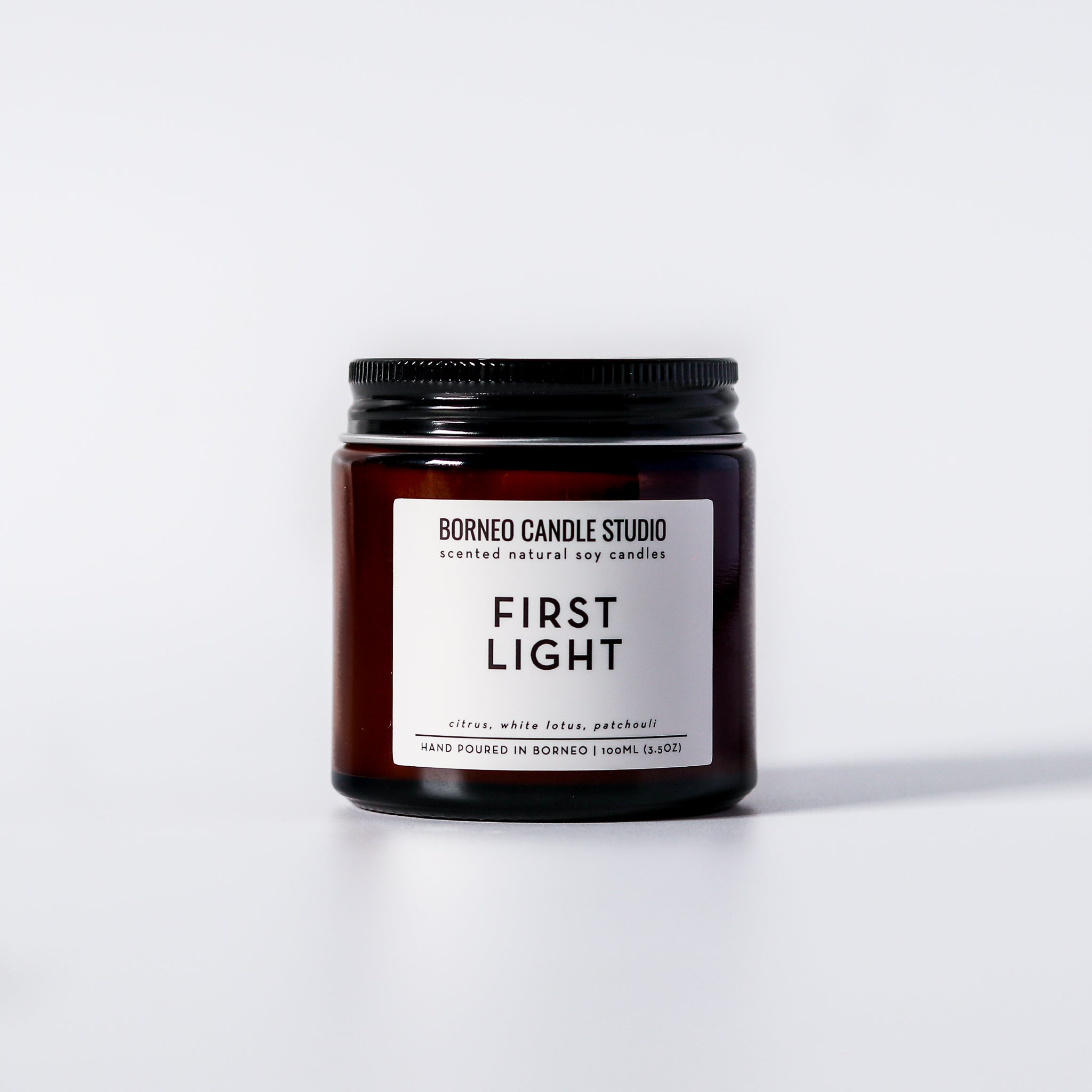 First Light Scented Candle - citrus, lotus blossom, patchouli earthy floral candle
