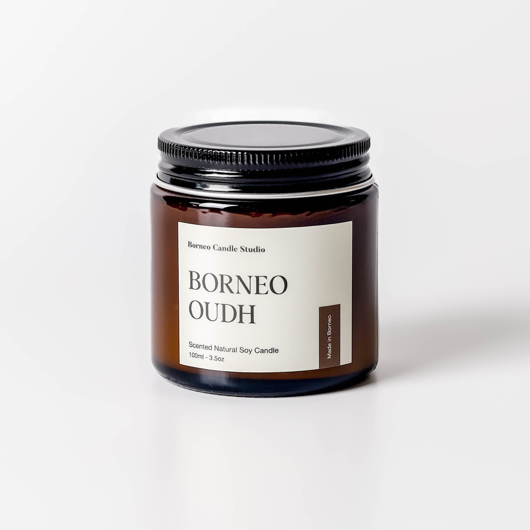 Borneo Oudh Soy Candle - agarwood, leather, elemi, oud scented candle in 3.5 oz amber glass jar with lid