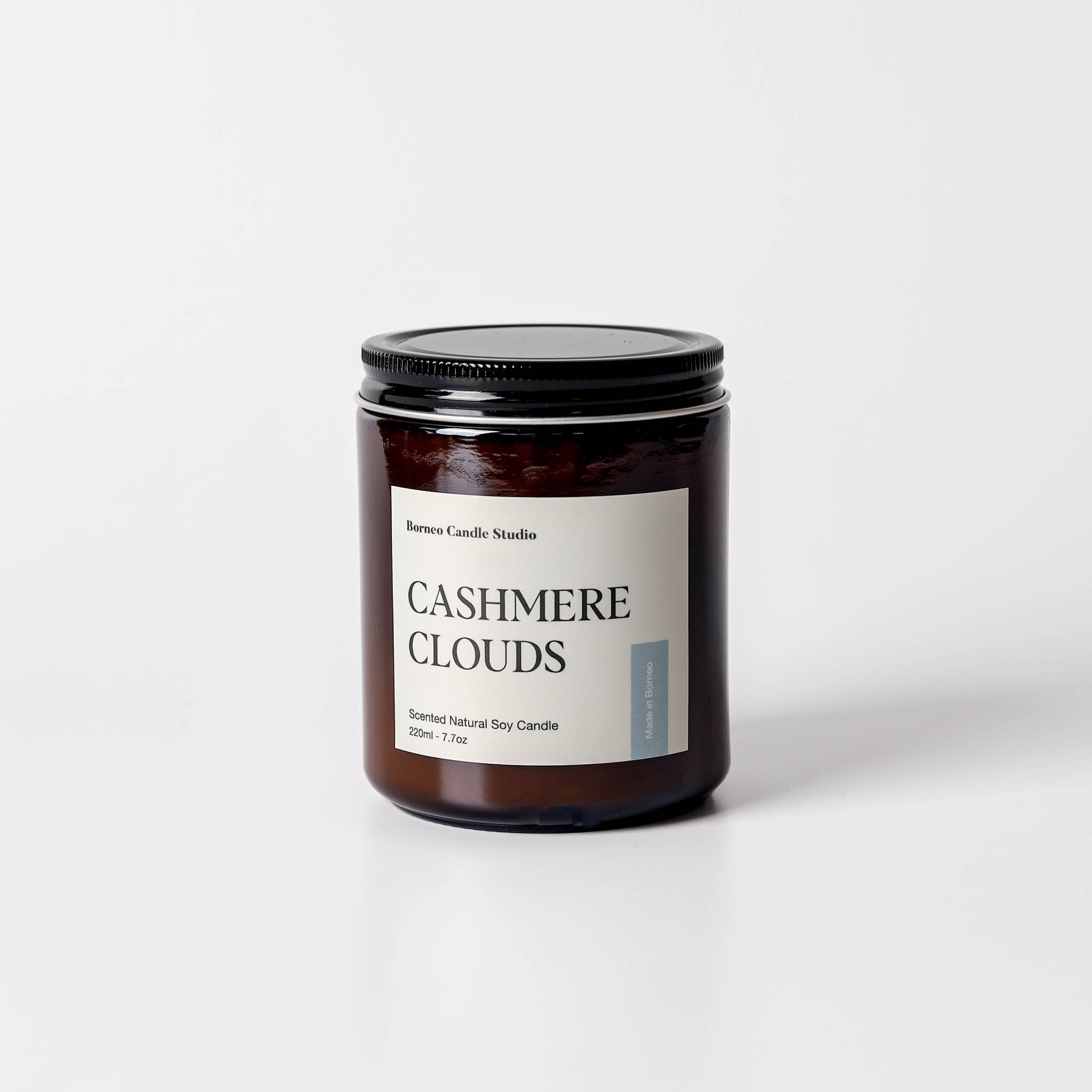 Cashmere Clouds Scented Candle - cashmere, tonka bean, sandalwood scented candle in 7.7 oz amber glass jar with lid