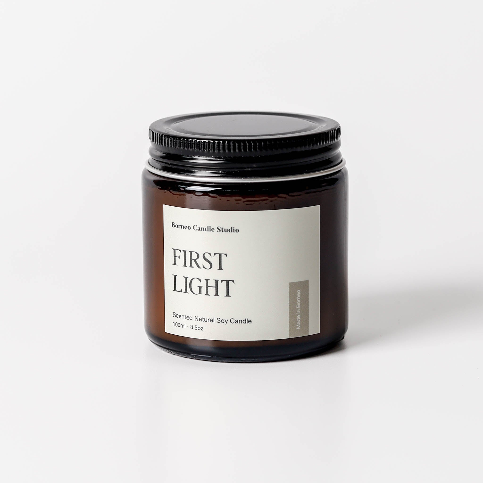 First Light Scented Candle - citrus, lotus blossom, patchouli earthy floral candle in 3.5 oz amber glass jar