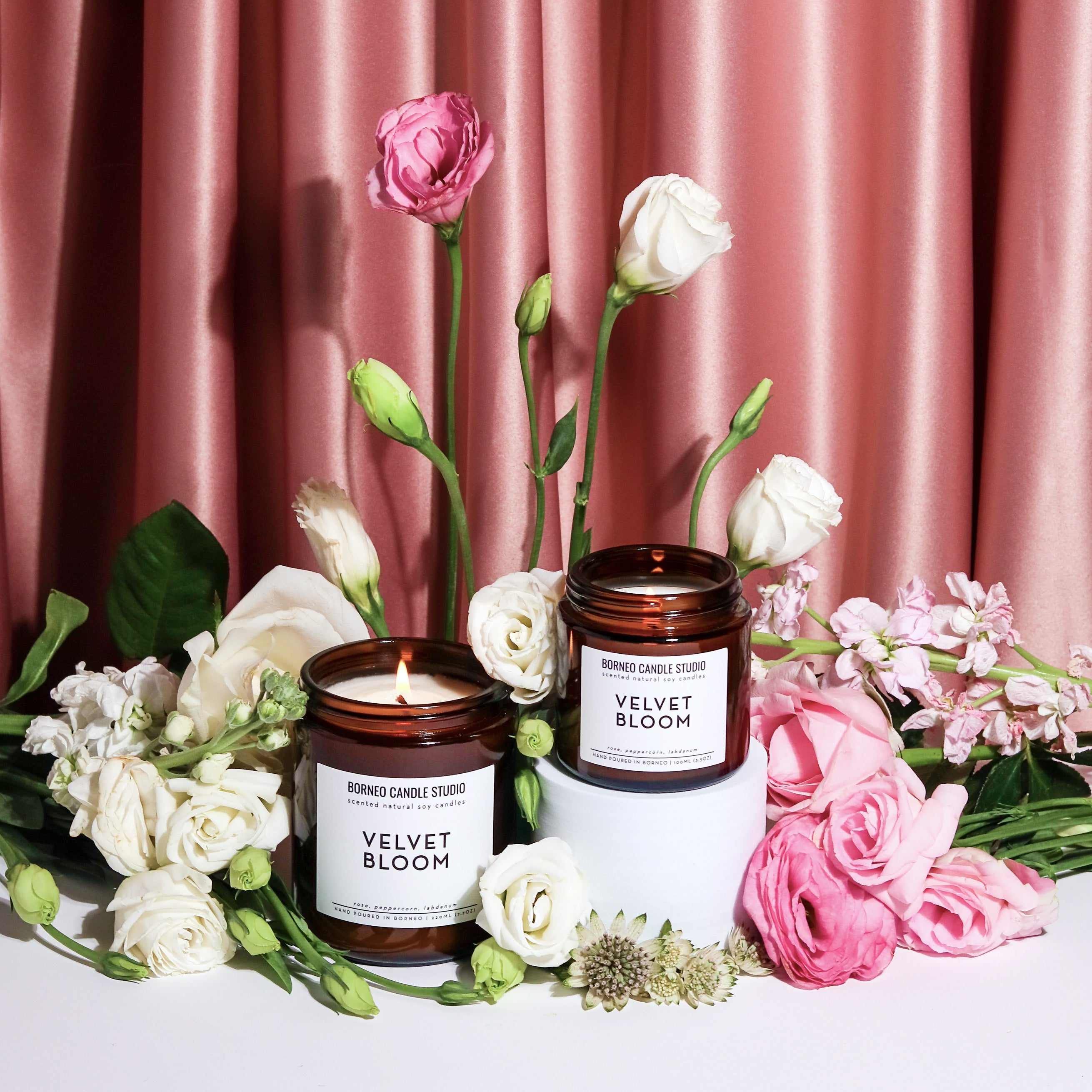 Floral scented candle called Velvet Bloom by Borneo Candle Studio. The scent contains notes of rose, peppercorn and labdanum